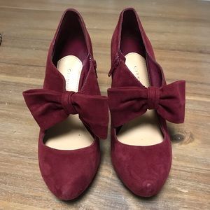 red suede shoe with bow